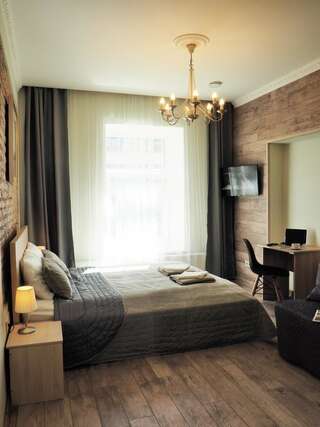 Апарт-отели Emi apartment Вильнюс Четырехместный номер с ванной комнатой-1